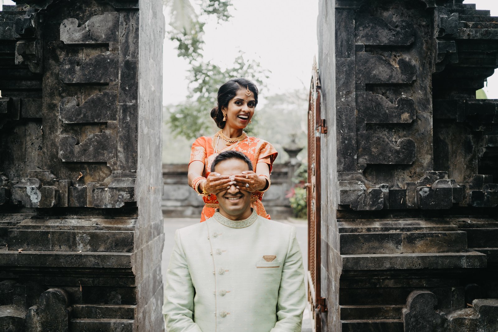 Traditional Indian wedding couple in elaborate attires
